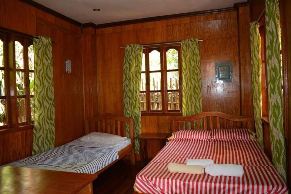 Nellie'S Tourist Inn- Port Barton San Vicente  Esterno foto